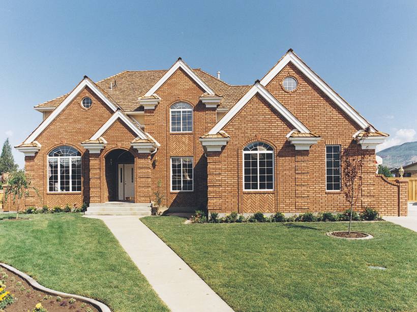 Brick home with symmetrical Don Young window layout